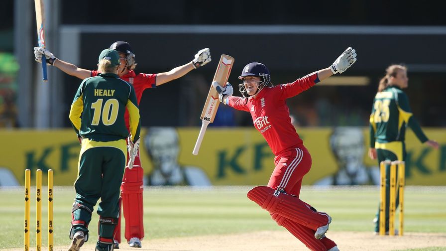 Retaining the Ashes. Taylor celebrates with Charlotte Edwards after winning the 2013-14 Ashes series down under.