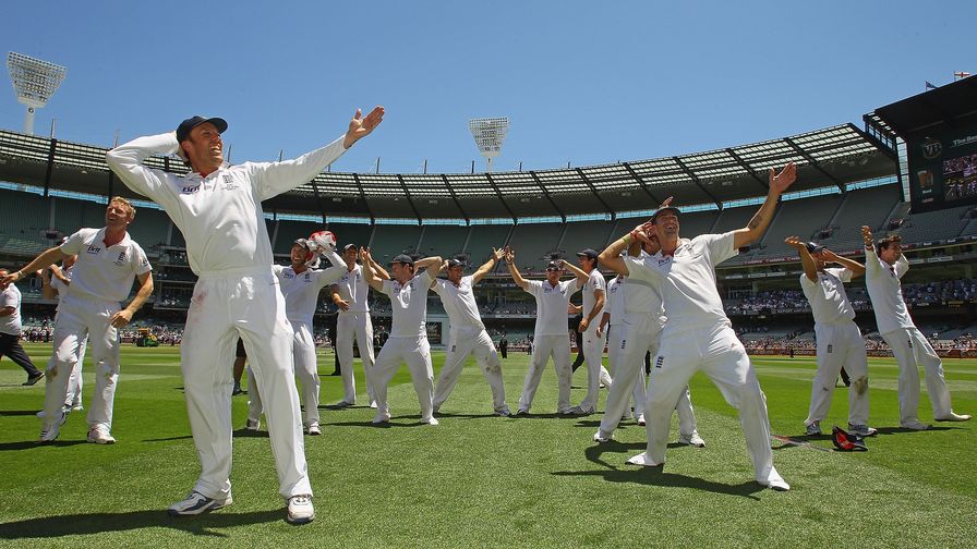 Sealed with a sprinkler. Graeme Swann leads the team dance as England retain the Ashes down under.