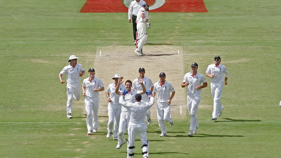 Awesome in Adelaide. James Anderson celebrates with his England teammates on the way to victory.