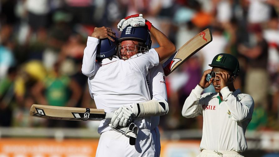 Graeme Swann and Graham Onions celebrate after batting to save the Second Test in Cape Town