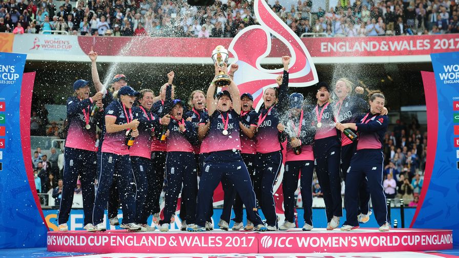 England women's captain Heather Knight lifts the trophy in front of a full house at Lord's.