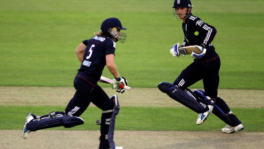 An increasingly familiar sight. Sarah Taylor and Heather Knight lead England to a series win over New Zealand.