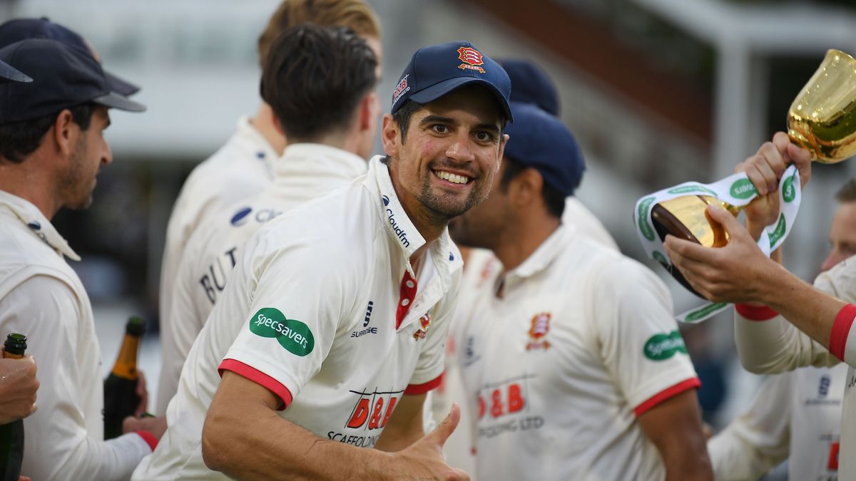 Sir Alastair Cook celebrates with teammates as Essex with the 2019 Specsavers County Championship