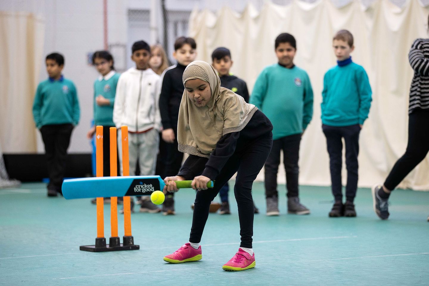 A young cricketer bats during a session at Sophia Gardens in Wales